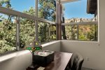 Bedroom 3 has two twin beds and looks out onto Sedona`s lush landscapes